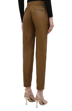 Женские кожаные брюки SAINT LAURENT бежевого цвета, арт. 664622/Y50A2 | Фото 4 (Длина (брюки, джинсы): Стандартные; Женское Кросс-КТ: Брюки-одежда, Джоггеры - брюки, Кожаные брюки; Силуэт Ж (брюки и джинсы): Джоггеры; Материал сплава: Проставлено; Материал внешний: Натуральная кожа; Драгоценные камни: Проставлено; Стили: Кэжуэл)